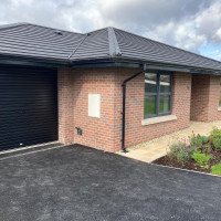 attached garage with roller doors